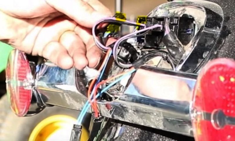 Disconnect the fender tip harness and plug your red/yellow wiring you created in step 4 into slot 2