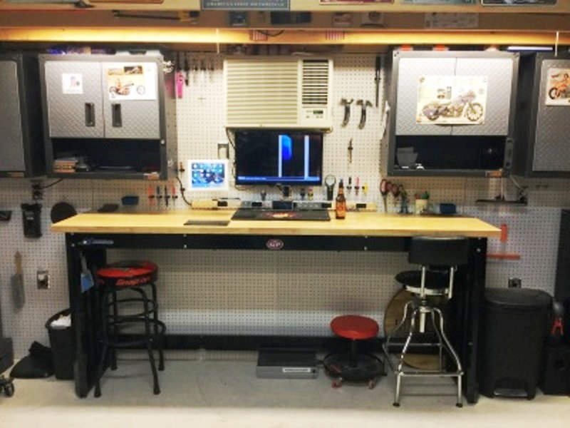 A sturdy workbench, with computer for reference, and AC for comfort