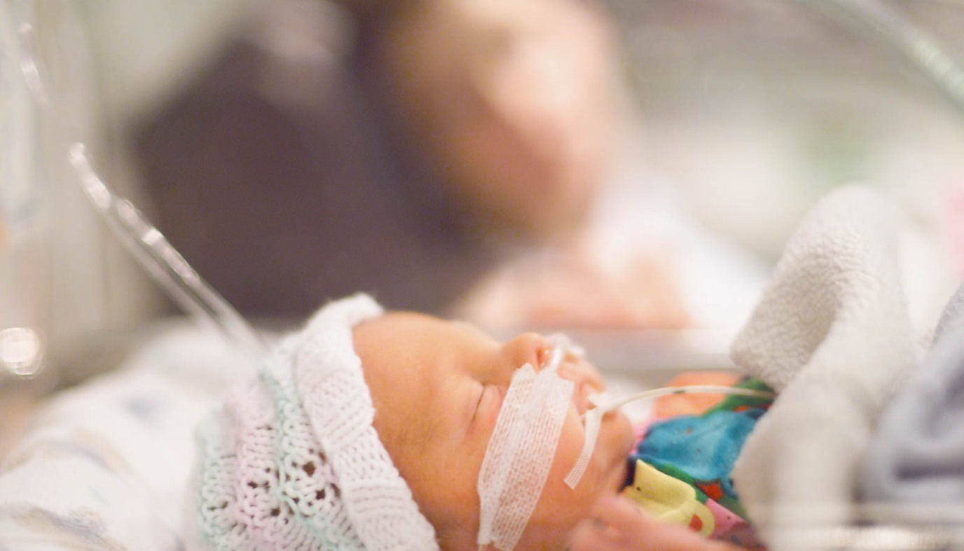 baby with breathing tube in the NICU