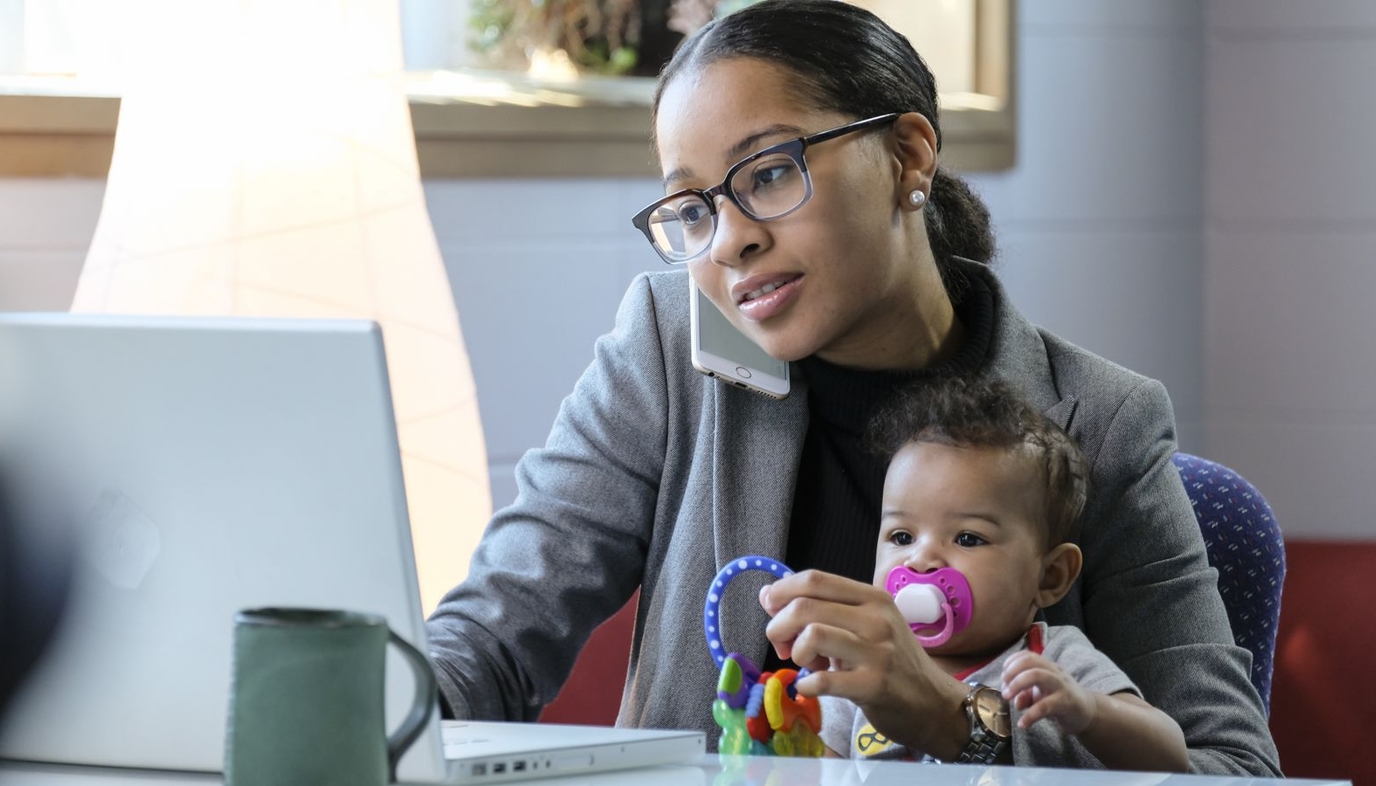 woman working at home with baby