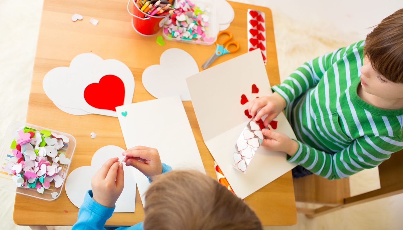 Kids making Valentine's Day cards