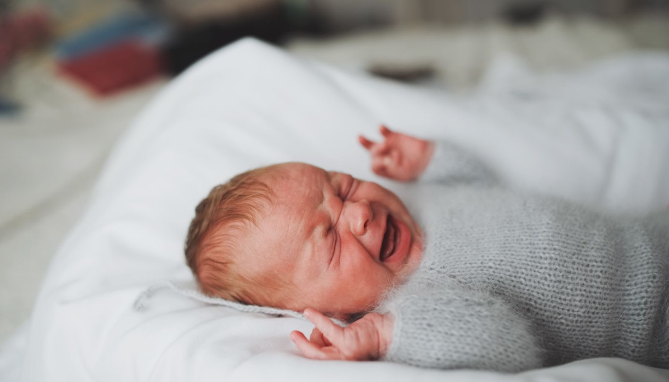 baby with colic crying