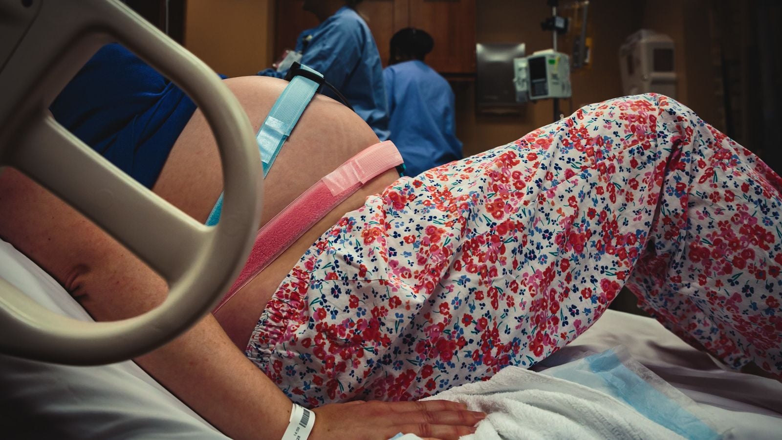 woman in labor with monitors on her stomach