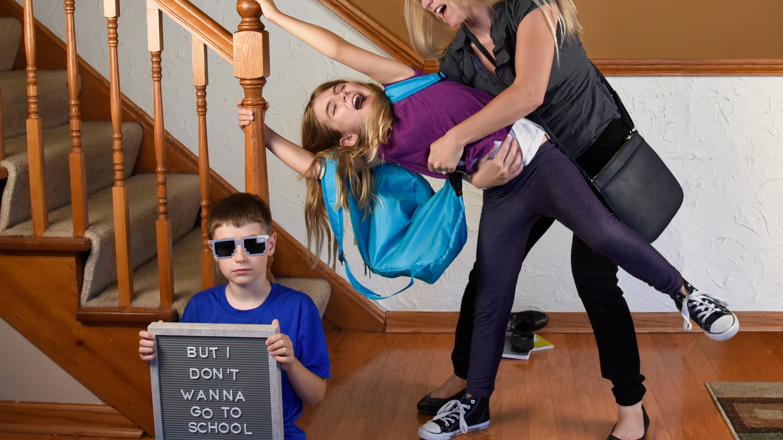 stressed out mom getting kids ready for school