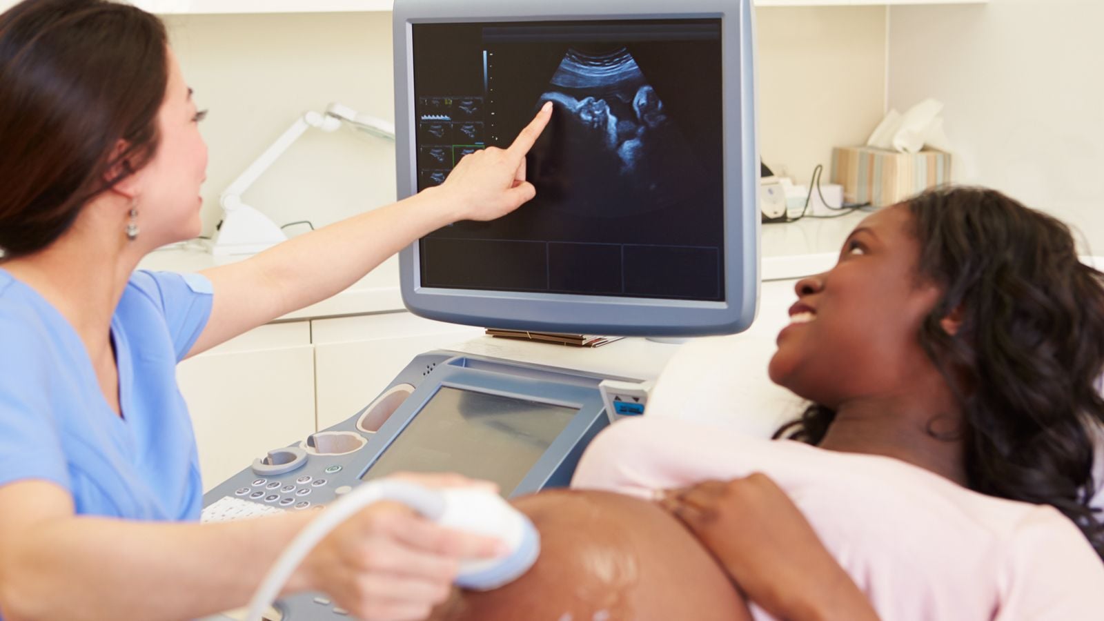ultrasound tech performing an ultrasound