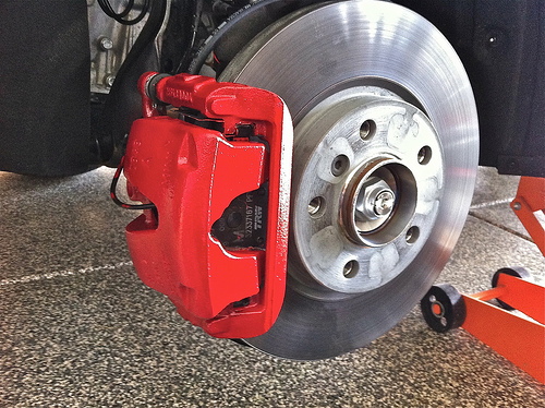 Apply several coats of paint to the calipers, allowing them plenty of time to dry in between coats