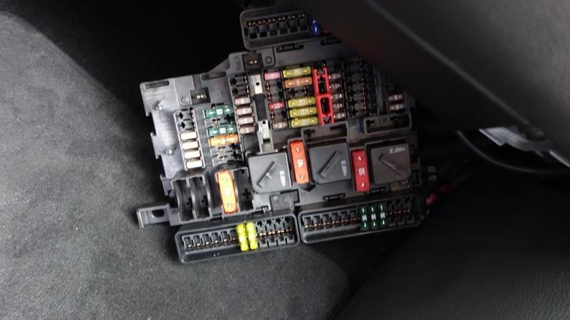 Pull down the fuse panel and locate fuse 52