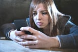 Woman in recovery struggles with social media obsession