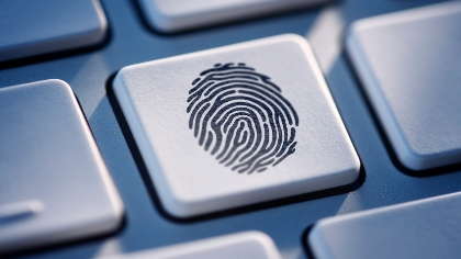 A fingerprint on a keyboard key. 