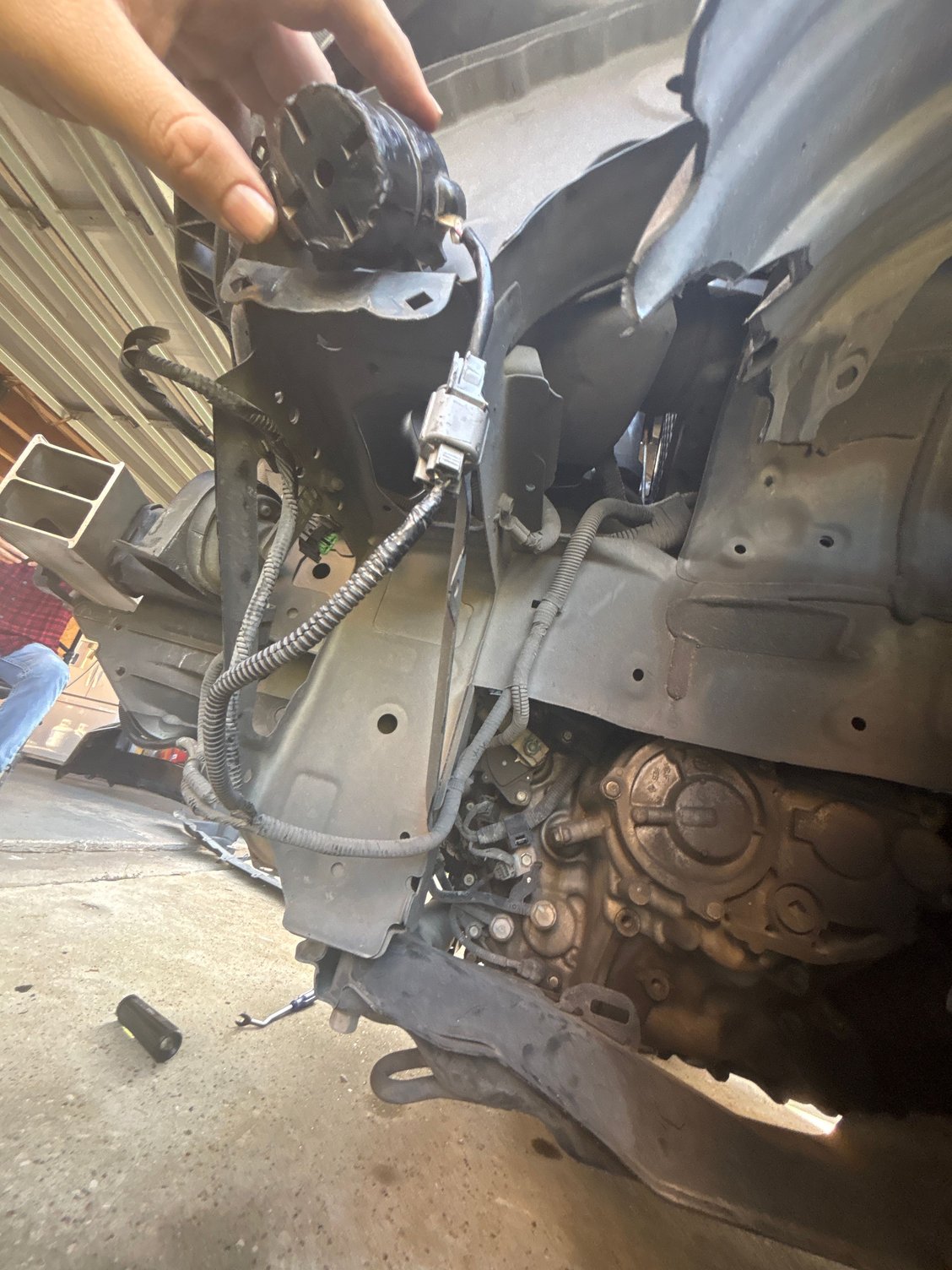 I have taken apart my bumper but still can't locate a bolt with a broken mount . Luckily we made it home still no issues presented only that the car no longer beeps when locked to confirm car alarm is set. Im searching my local pick-a-part locations in hopes they have one so I can follow the wire harness to see where it goes. I will update soon I appreciate the advice!