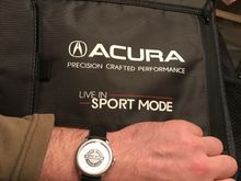 Got an Acura laptop bag and parts service watch.