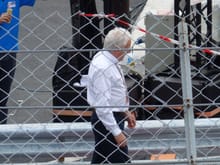 Charlie Whiting inspecting the repairs made to the Armco post-crash