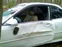 Driver door.  Gosh I am glad I was wearing seatbelt!  They save lives!