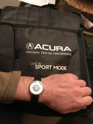 Got an Acura laptop bag and parts service watch.