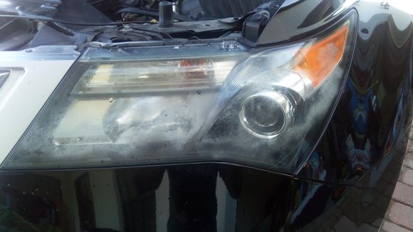 Oxidized driver side headlight