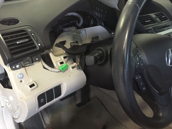 Remove the silver plastic piece that holds the dimmer switch which allows you to move the plastic piece between the gauges and the steering wheel