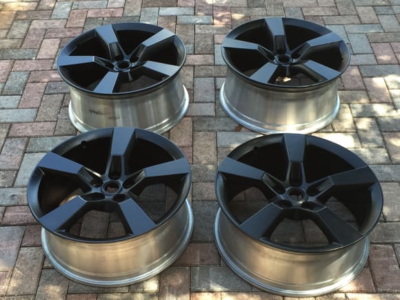 I finished painted the wheels and they came out great. I used Dupicolor Satin Black and Matte Clear.