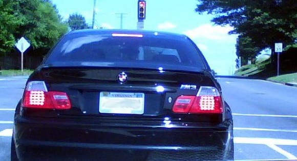 bmw with red/white logo vice the usual blue/white.