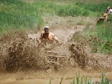 One of the best pictures taken that day! Look at the freeze frame of the mud splash. He was riding an ARCTIC CAT but we won't hold that against him, LOL..