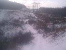 Big hills on the power lines.  See the moose?  Hint:  He's wearing an orange hunting jacket...