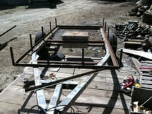 welding the top rail uprights to the bottom rail