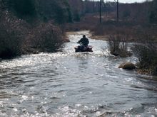 crossing a river in the spring / tri-state trails from beergut's house.