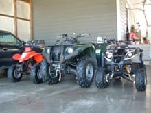 2010 Yamaha Grizzly 450 and her little babies. 07 Kymco 90 belonging to my grandson Dakota. Panther 110 belonging to my granddaughter Cassie.