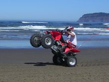 Wheelie on the beach at Sandlake, August 2004