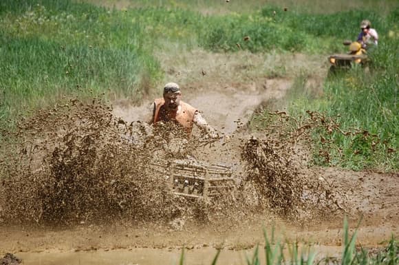 One of the best pictures taken that day! Look at the freeze frame of the mud splash. He was riding an ARCTIC CAT but we won't hold that against him, LOL..