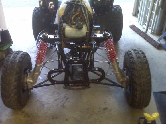 wider arms, increased camber, steering stabilizer,