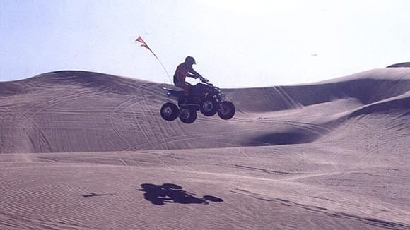 Jumping my Raptor at Glamis by the top of Oldsmobile Hill.                                                                                                                                              