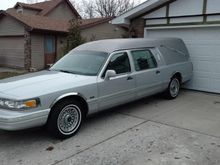 Morticia, a 1997 Lincoln Town Car built by Eagle Coaches.  