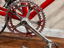 Rino red anodized chainrings, a little lighter than Campy, SR titanium pedals, Christophe Z clips anodized black, alloy, Merz titanium nuts and washers on titanium spindle SR second generation BB...