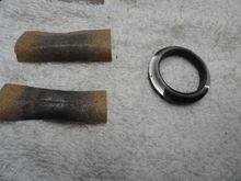 Two passes with 220 grit paper to remove damage to the race.  Paper show the amount of material removed.