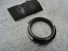 One pass with 600 grit wet paper and paper with material removed.  By now the finish is starting show the mirror effects.