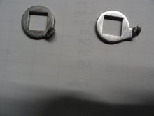 Note the position of the stop in the left one.  It allows for more return if the shift lever if you are using the older style of lever.  The right one is correct for the older levers which have less cable wrap up than the newer levers.