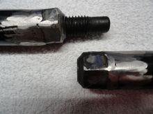 Both ends of the tool that screw together inside the bottom bracket and outside the stuck cup.