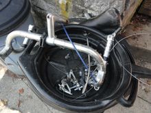 Most of the parts in the washing tub.  Pedals are rough and might not be salvage-able.  Good news is the Cat-Eye computer works.  