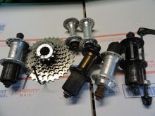Cassette looks to be a bit of a mega-range.  All are some manner of a Shimano style freehub system.