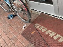 Wrenching on my chain in front of the lbs. I couldn’t believe my good fortune when my chain broke a quarter mile away…. Then I couldn’t believe my good fortune when Starbucks was open so I could wash my hands after repairing my chain. 