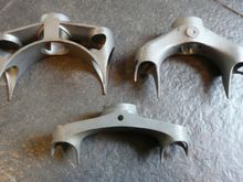 Bottom one is an early-'80s Cinelli OR that I modded, adding some here, machining away there, lighter overall.