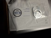 Pack of six spacers and the bizniz card.