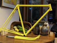 Here are the frame and fork after Race Metalworks has powdercoated them. Significantly brighter than the original yellow! I'm still making the adjustment...