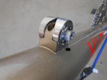 These backing plates have been modified to fit "down in there," and then drilled for set screws, and then they are also JB-Welded in place.  So far, they've been very solid.