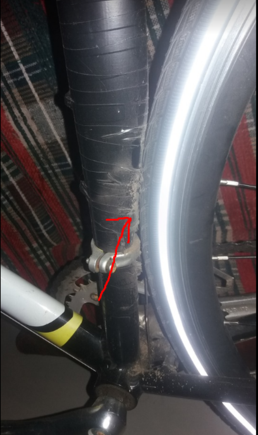 Spot where the tire is touching the frame.