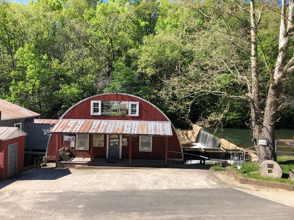 An old grist Mill. Note the dam and old millstones