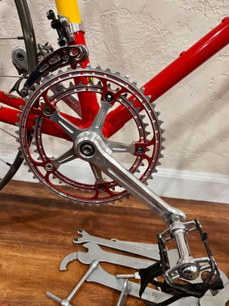 Rino red anodized chainrings, a little lighter than Campy, SR titanium pedals, Christophe Z clips anodized black, alloy, Merz titanium nuts and washers on titanium spindle SR second generation BB...
