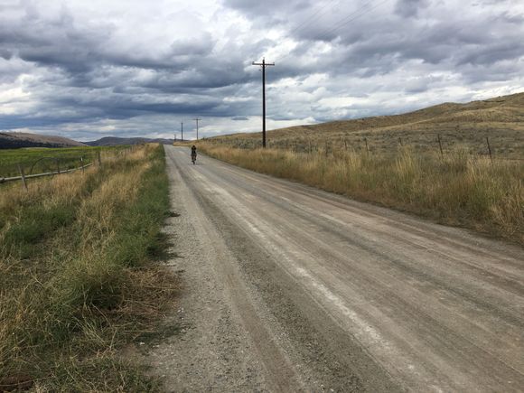 Below, on that road, there is a rider down there.  And that’s where I am going.  YeeeHaaaaa