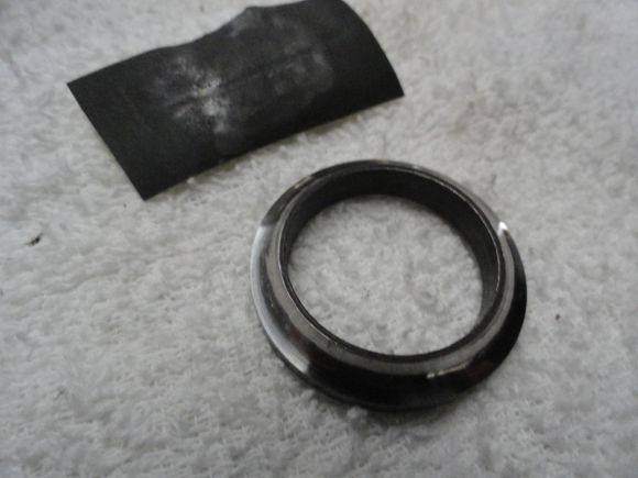 One pass with 600 grit wet paper and paper with material removed.  By now the finish is starting show the mirror effects.