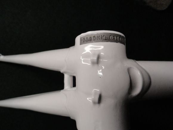 Serial number is blocked off so easily readable, but should get clear coated.  Serial number is:
580 DMW D91041  